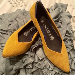 Rothy’s ballerina flats in marigold color